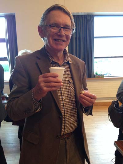 Liam McCaughey, past Chairman of the Alpine Garden Society Ulster Branch and a member of IGPS, enjoying the tea and home made cakes after the lecture. 